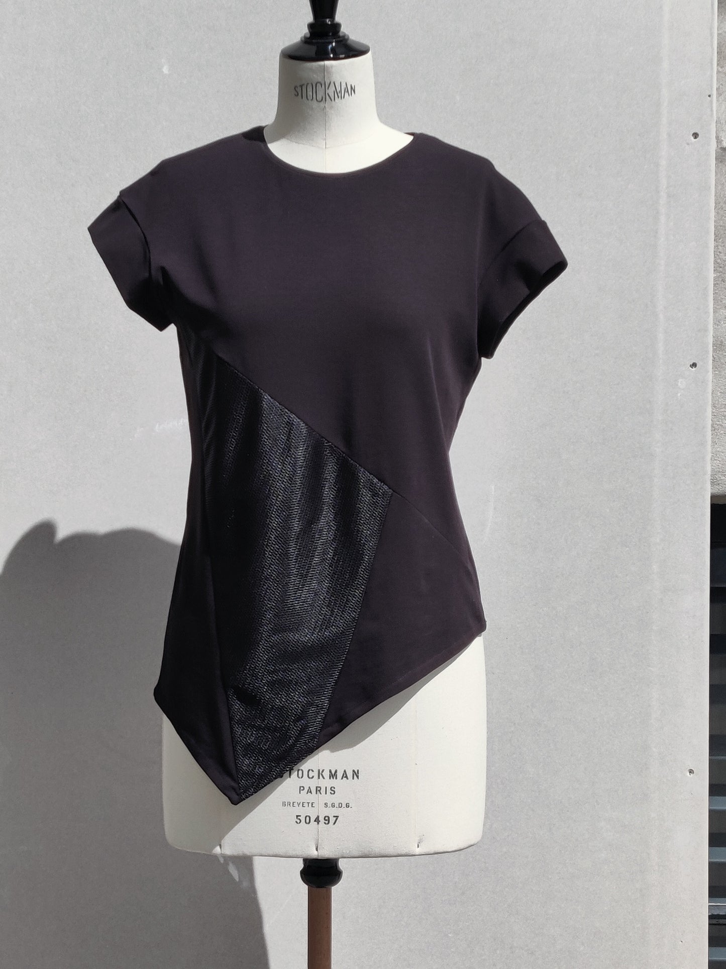 Front view. The Ashley T-shirts shoulders are dropped with cap sleeves. Ashlee has a loose fit.