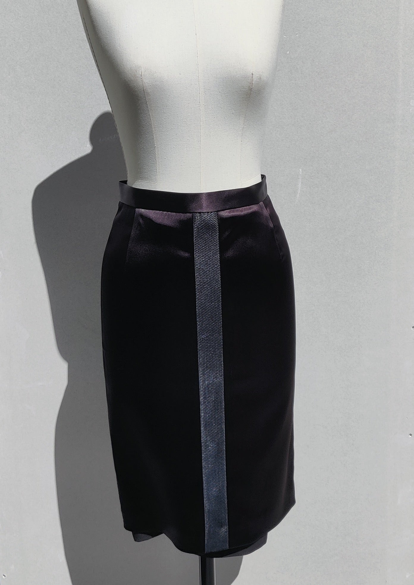 Front view. The Annouk skirt (black) has a visible dropped silk lining and a mesh detail both center front and center back.