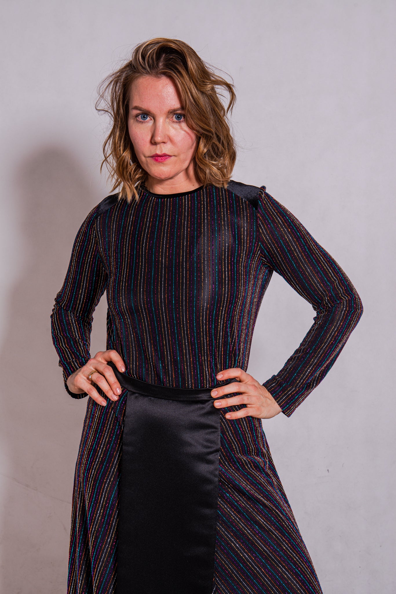 Model wears Ailo top, multi stripey and Aya skirt stripey multi