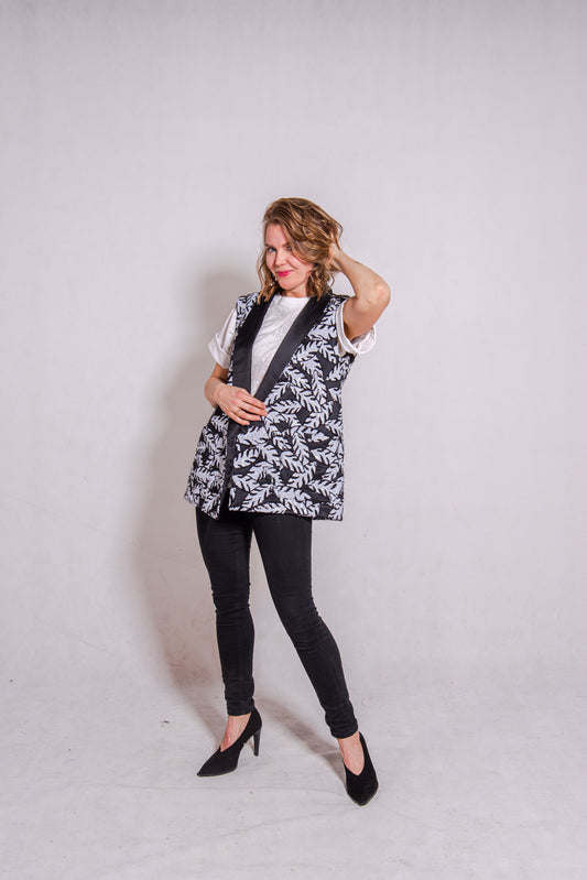 Woman wearing Alison - a double-breasted sequin gilet.