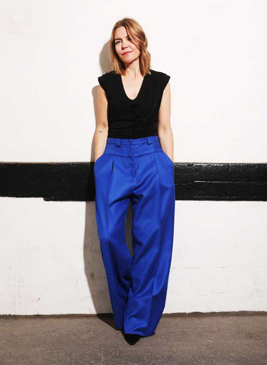 Ava is our classic wool trouser, it has deep pockets and a wide leg. Paired here with an ASRA body socking black.