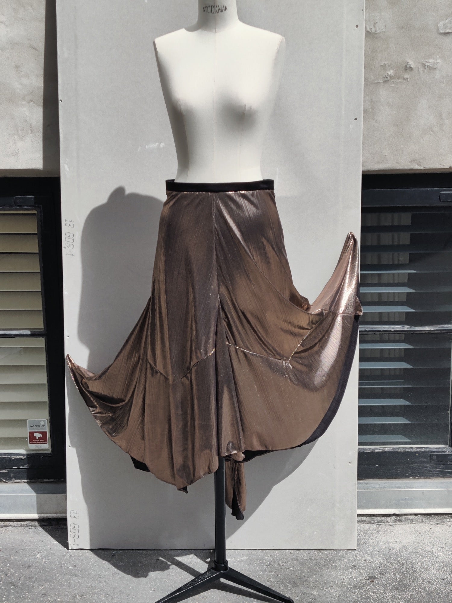 Alyza skirt bronze, front, on dummy. Pinned to show volume.