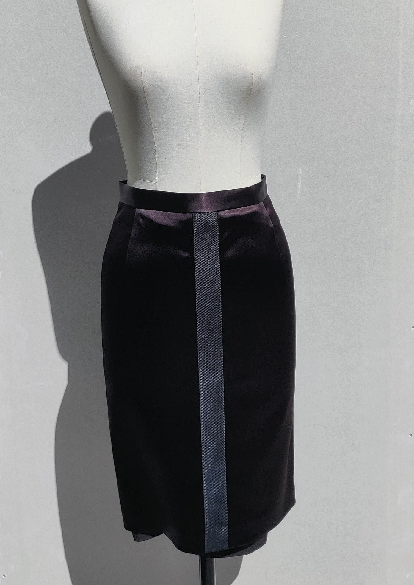 Front view. The Annouk skirt (black) has a visible dropped silk lining and a mesh detail both center front and center back. 