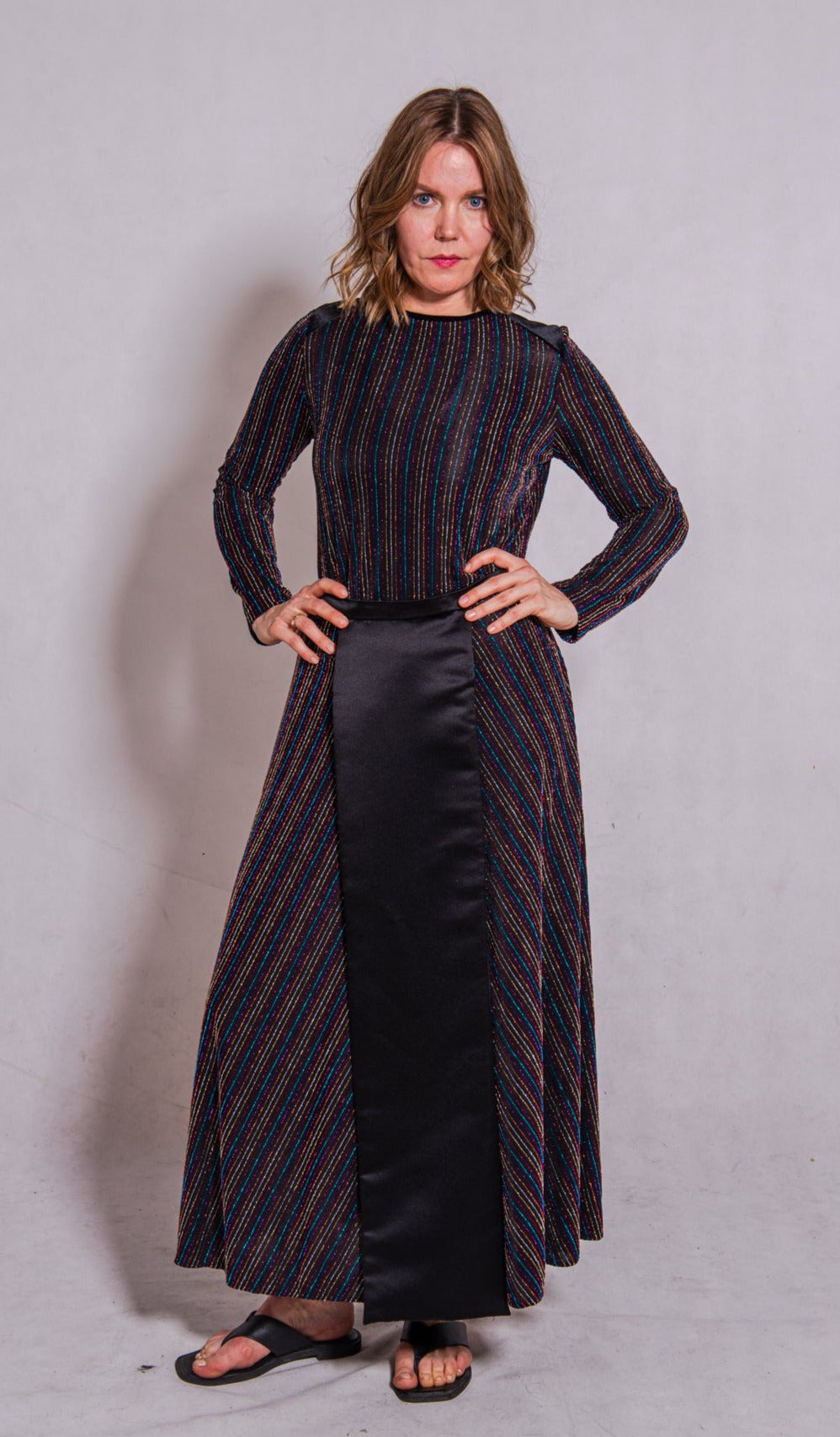 Model front facing wearing Ailo top stripey multi paired with Aya skirts stripey multi