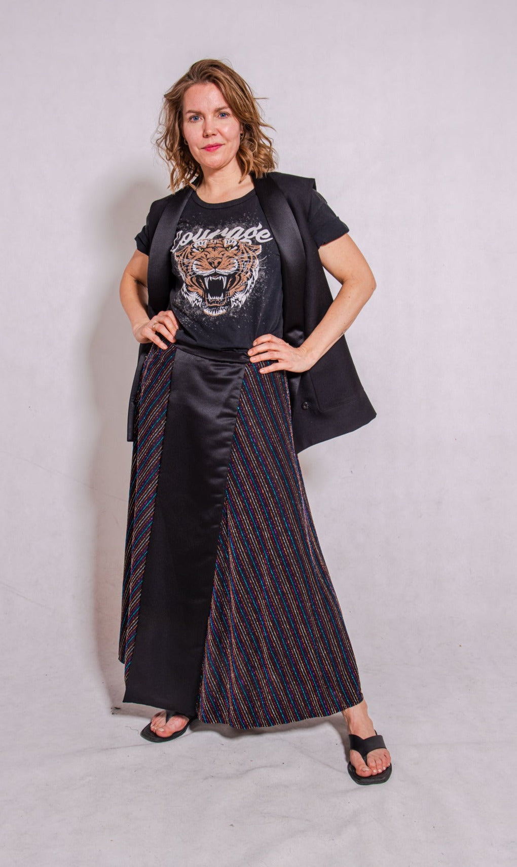 Model wears Alison Gilet, black, Aya skirt, stripey multi & own tshirt